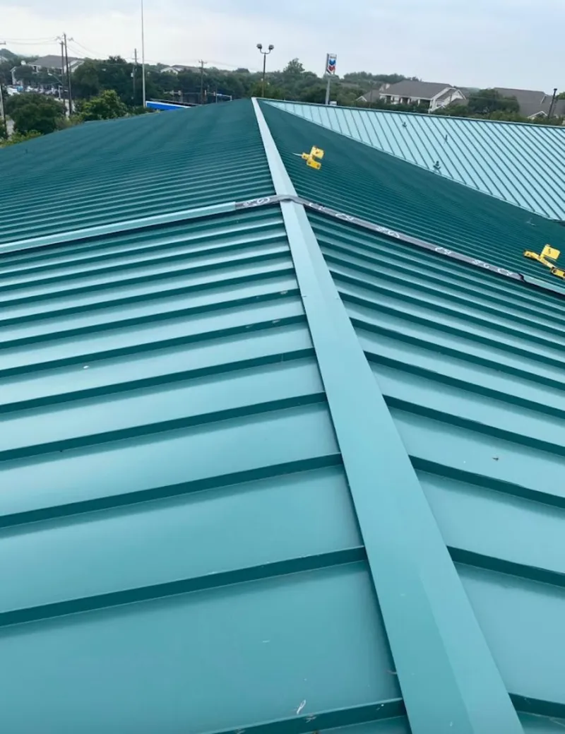 Green commercial metal roof ridge and valley for Metal Roof Repair in Turlock